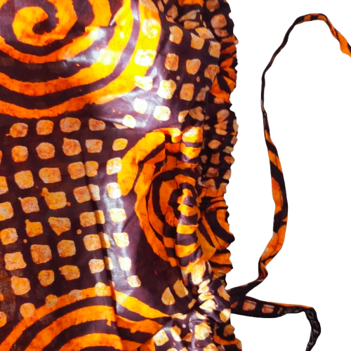 Detail van de gele Brocade lange broek met Afrikaanse print voor dames